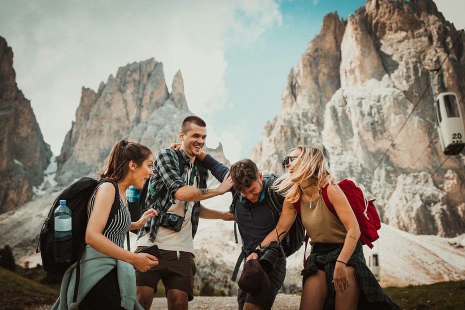 How to plan perfect family holiday guide showing family discussing vacation planning together